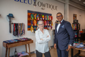 Sue Mosey of Midtown Detroit, Inc. with Ne’Gyle Beaman of Bleu Bowtique